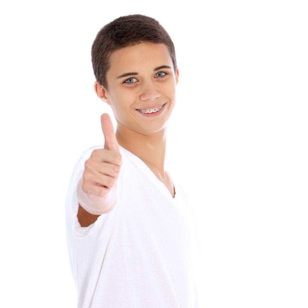 Smiling Teenage Boy Giving Thumbs Up